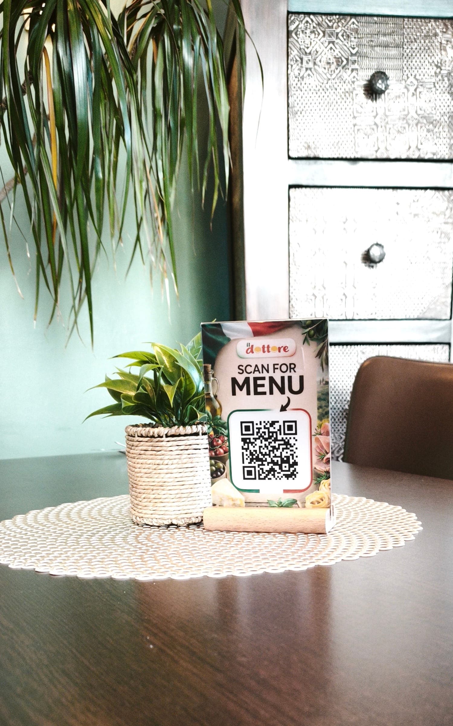ARMAUT QR-code table stand on a dining table